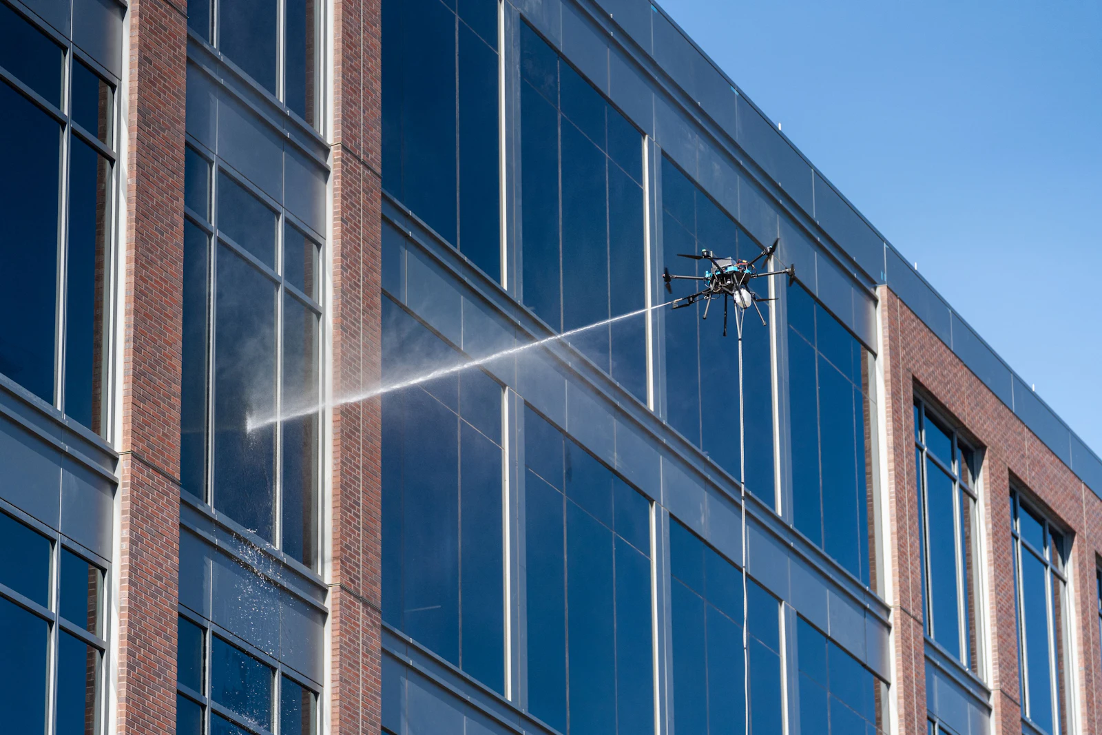 Building exterior being washed